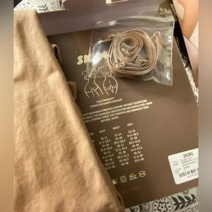 New SKIMS Shorty Body Suit